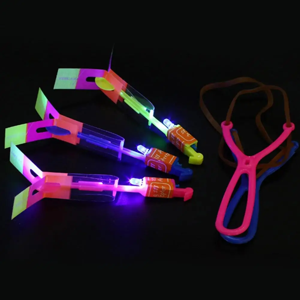 10Pcs Funny Luminous Slingshot Flying Arrow LED Light Up Flashing Dragonfly Glow For Kids Party Toys Gift Color Random