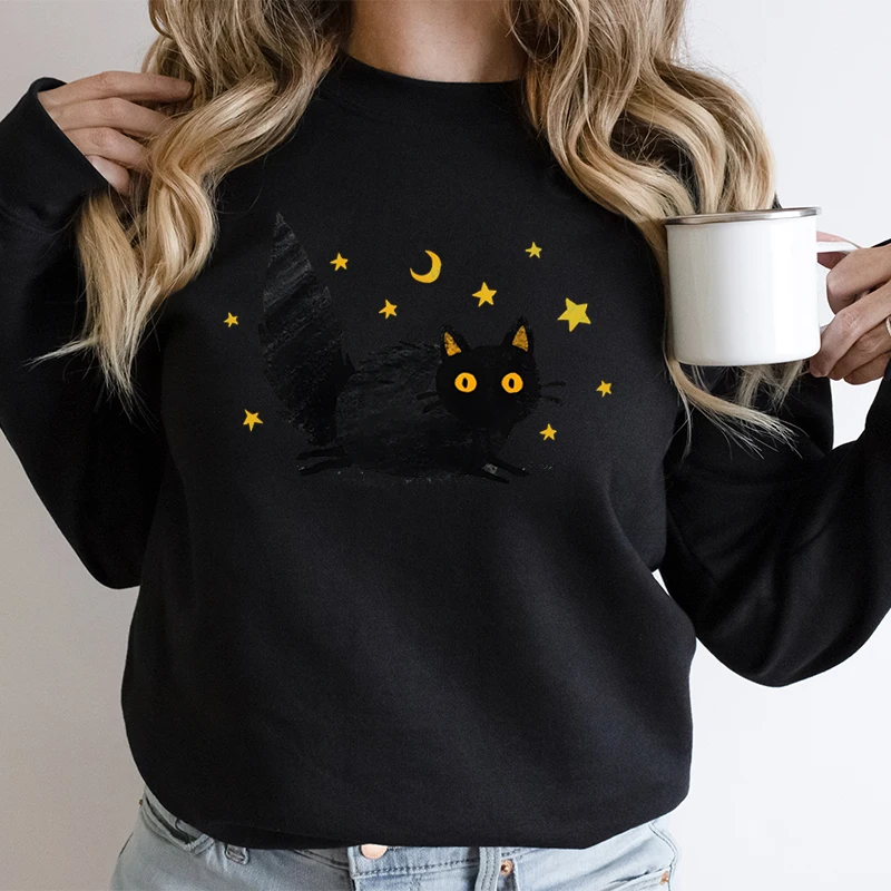 Felpa da donna alla moda con grafica gatto stelle e luna, occhi gialli, soffice gatto nero, tendenza, abbigliamento per ragazze, maglione gattino cartone animato