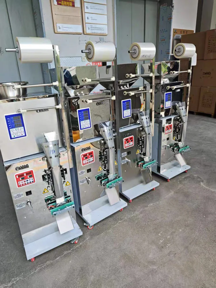 

110V/220V Top Quality Granule Powder Packaging Machine Seed Tea Coffee Bean Milk Powder, Etc Weighing Packaging Sealing Machine