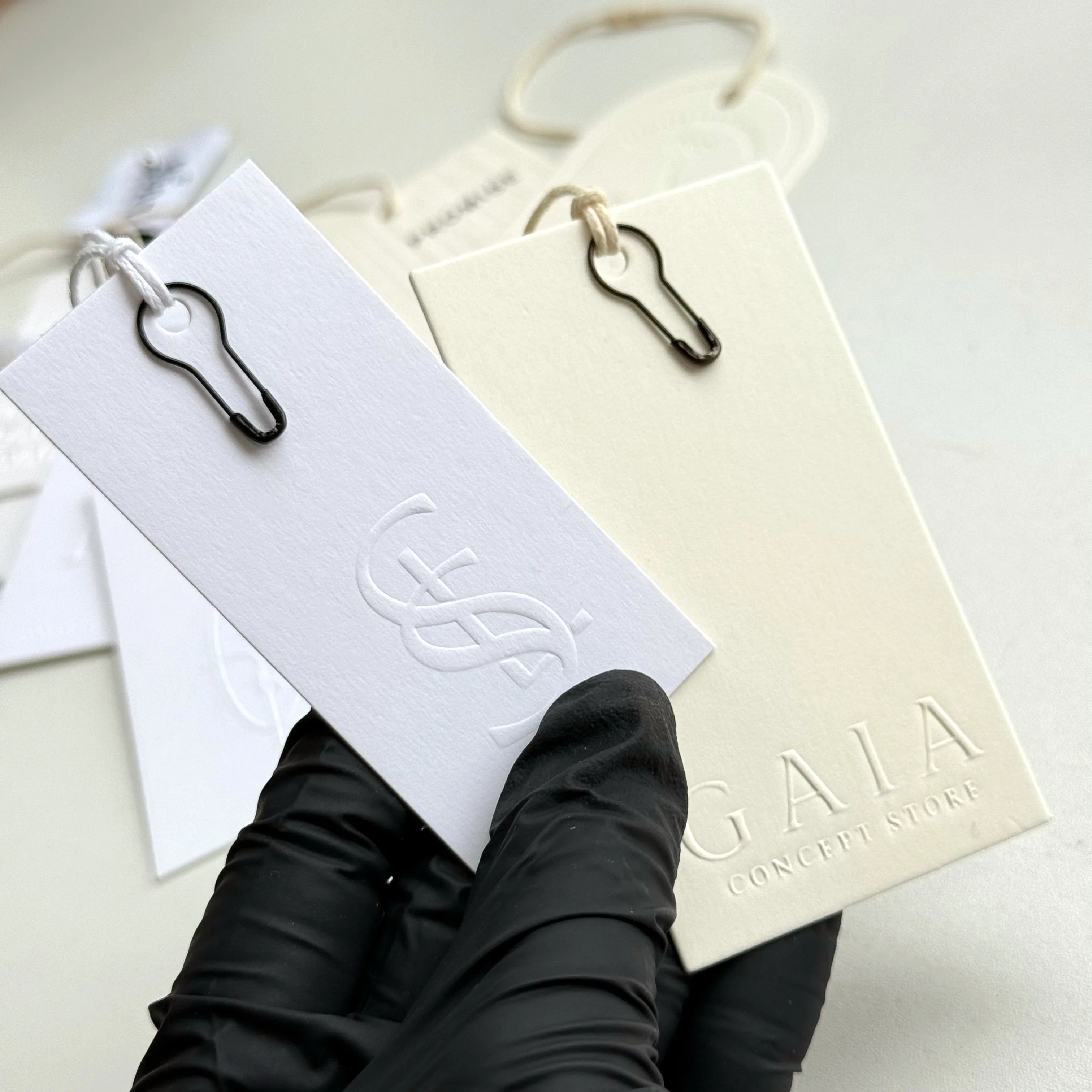 

High End Embossed Logo Hang Tags Custom Brand Printed Price Labels, Luxury Paper Swing Tags for Garments, Bags, Shoes