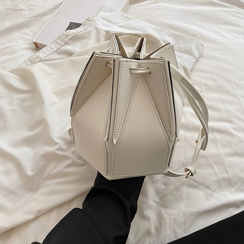 Popular niche folding bag women's 2026 summer new versatile messenger bag portable bucket bag