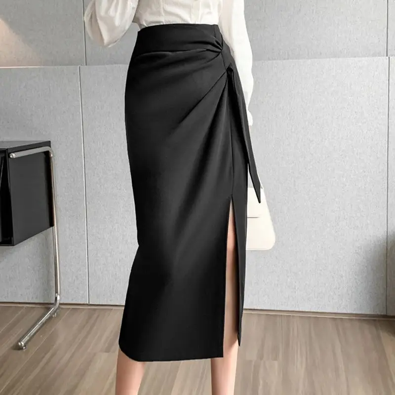 Elegant Zipper Folds Bandage Slit Asymmetrical Skirts Women's Clothing 2024 Spring New Loose Solid Color Office Lady Skirts