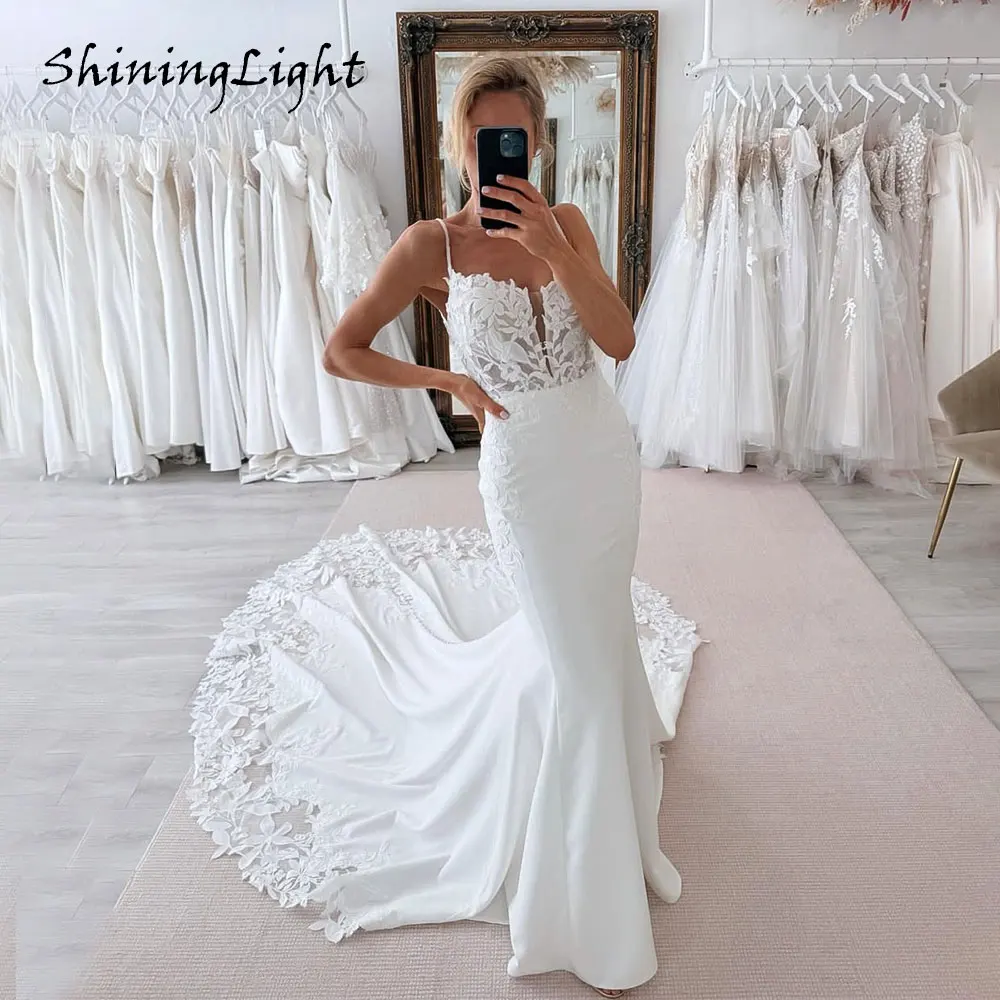 

ShiningLight Sexy White Spaghetti Straps Mermaid Wedding Dress Sweetheart Lace Applique Backless Boho Bridal Gown Customized