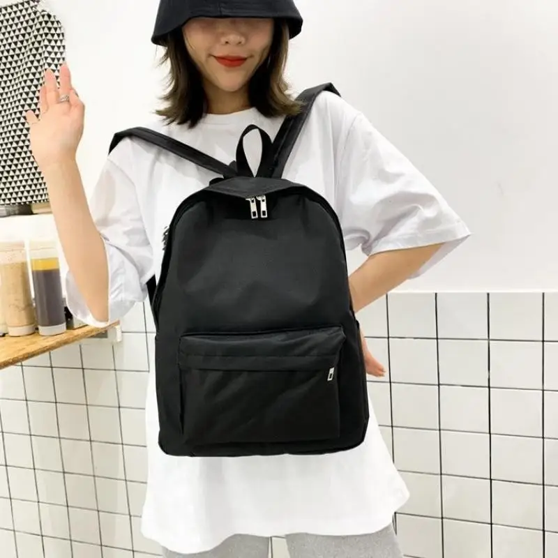 Mochila de nylon versátil para estudante escolar, bolsa de viagem, preto e branco, grande capacidade, bolsa para computador