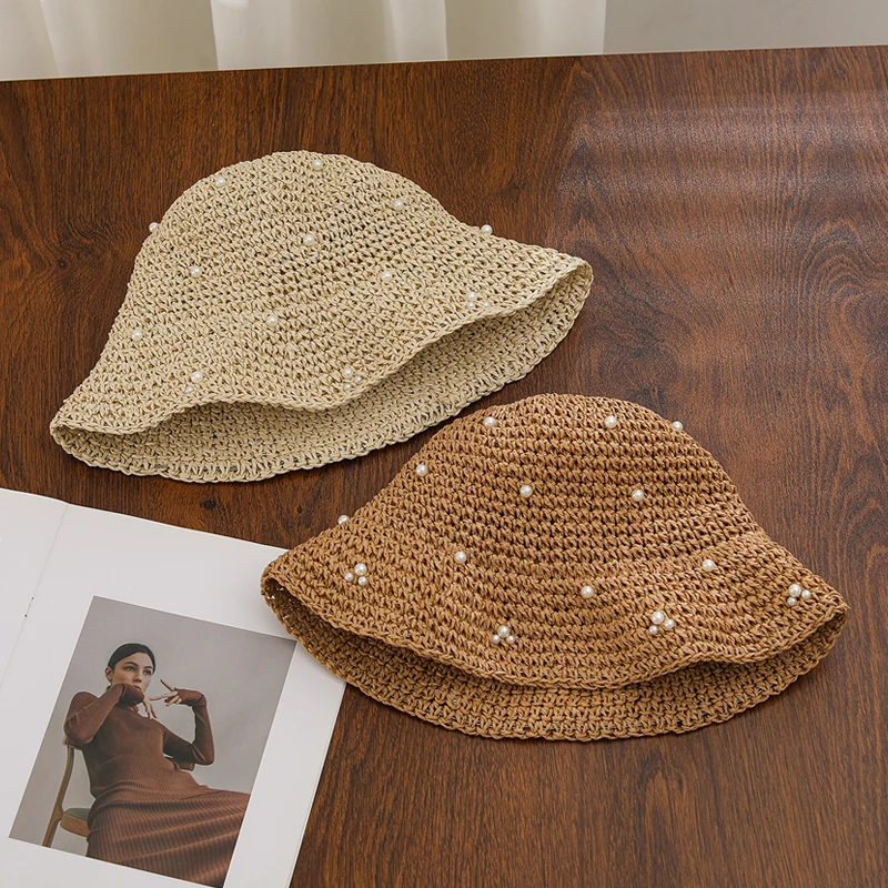 Summer outdoor sunshade hat for women, hollowed out breathable straw woven bucket hat, high-end pearl fisherman hat