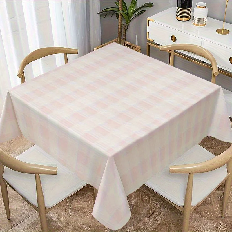 A soft, fashionable and attractive powder-white checkered tablecloth, machine washable and easy to clean.