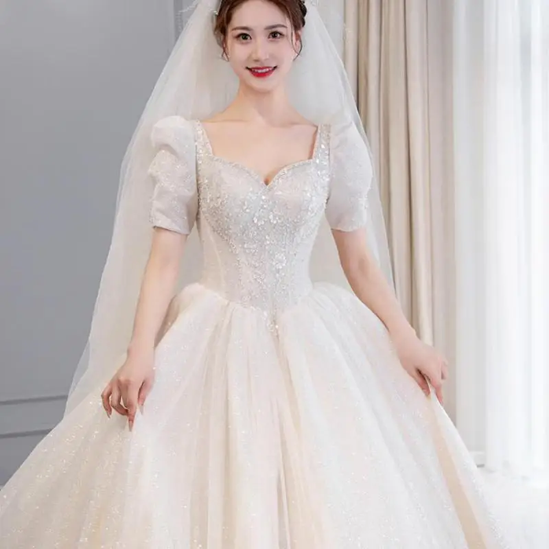 

Customized New Shiny Ball Gown Wedding Dresses Sweet Applique Princess Bridal Dress Simple Exquisite Sukienki Na Wesele Damskie