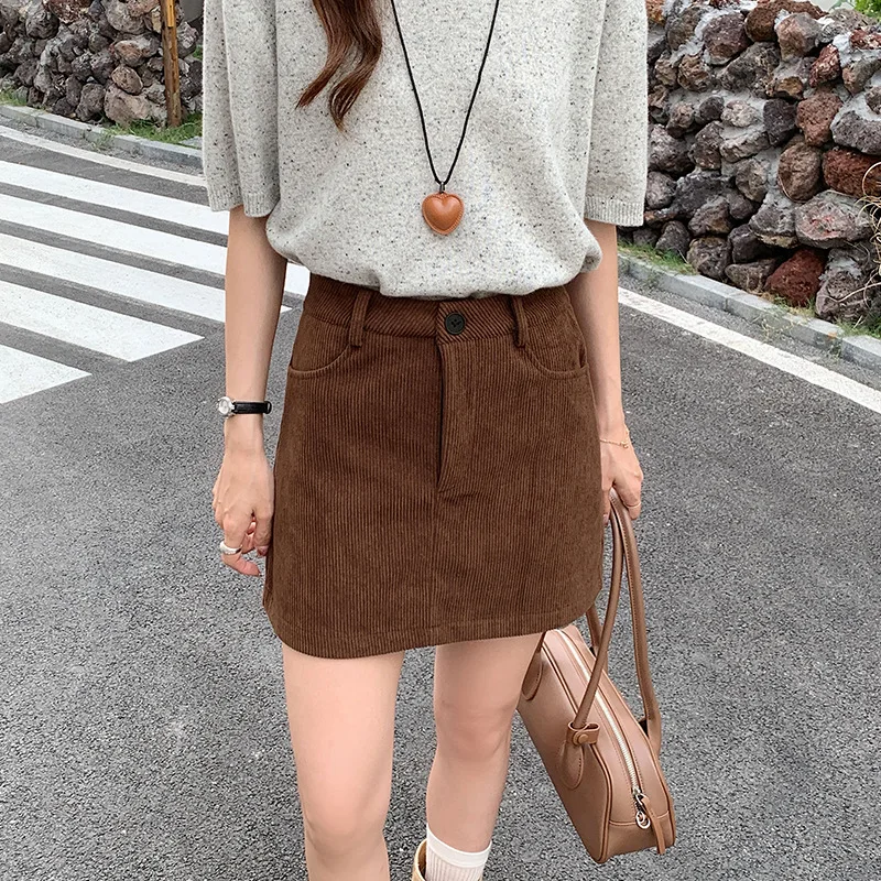

Вельветовая мини-юбка с высокой талией для женщин, осенняя новая стильная юбка трапециевидной формы в стиле ретро для колледжа, облегающая пышная юбка с карманами