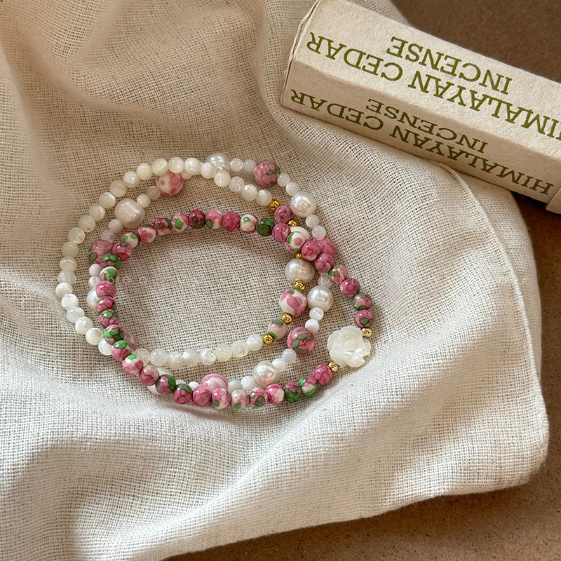 Natural Stone Shell Camellia Bracelet for Women - Unique and Chic Design, Adds a Luxurious Touch to Your Summer Look.