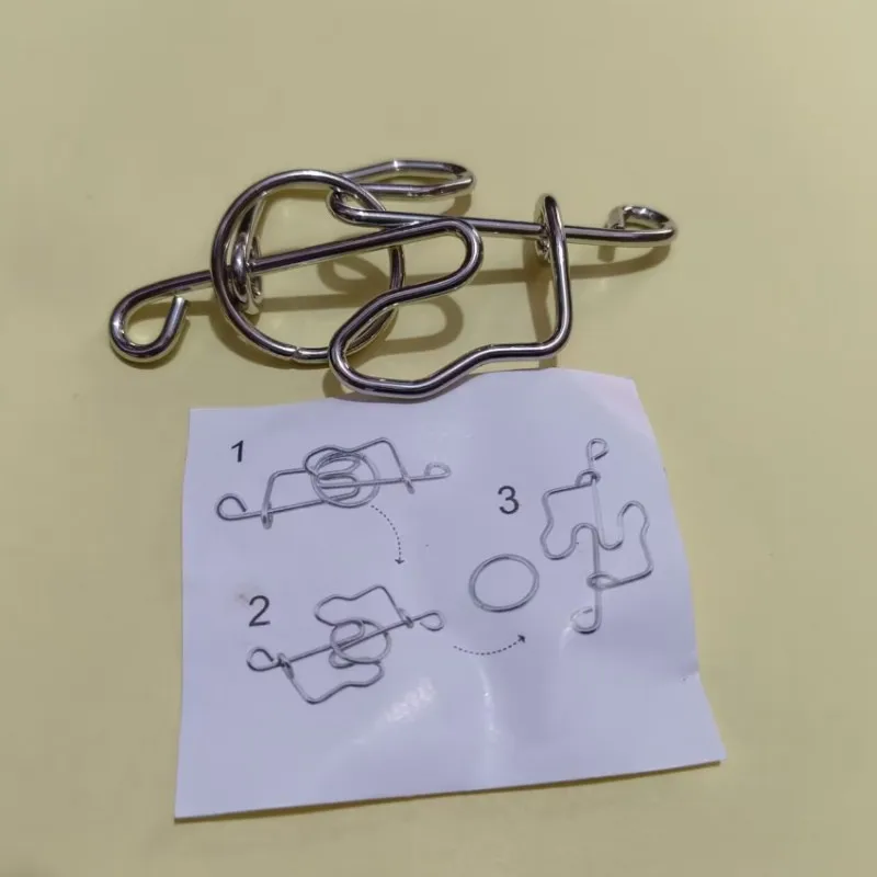Metal Wire Puzzle Solution Brain Teaser Magic Rings Puzzles Game Toy