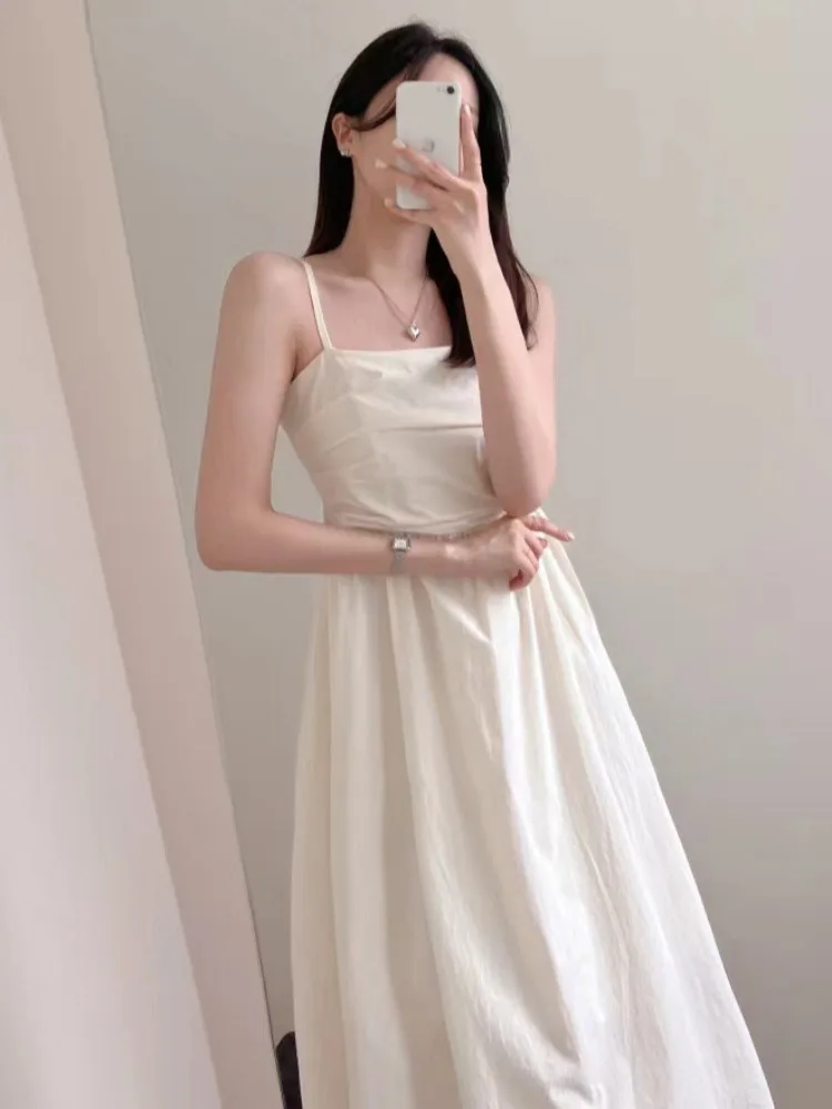 تنورة طويلة صيفية أنيقة بخصر مرتفع وتصميم ملفوف بدون أكمام، مناسبة للعمل، بأسلوب حلو من ألياف البوليستر