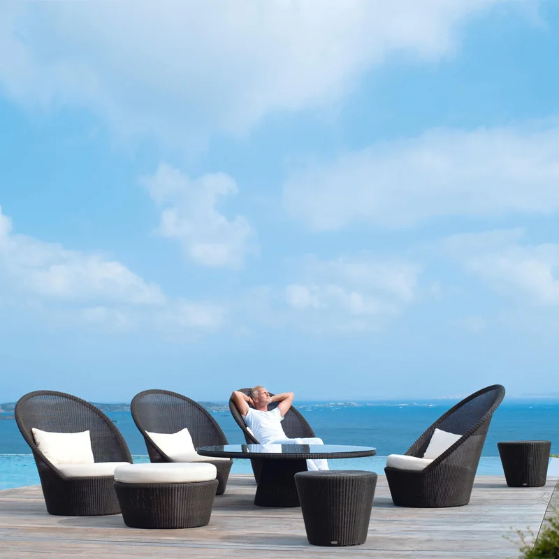 Nordic courtyard high backrest rattan table and chair sofa hotel outdoor leisure rattan chair tea table three-piece combination