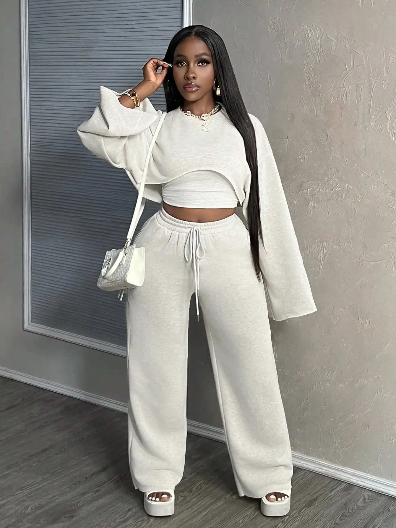 

Cream Solid Cropped Long Sleeve Top with Bell Sleeves & Wide Leg Sweatpants 3-Piece Set