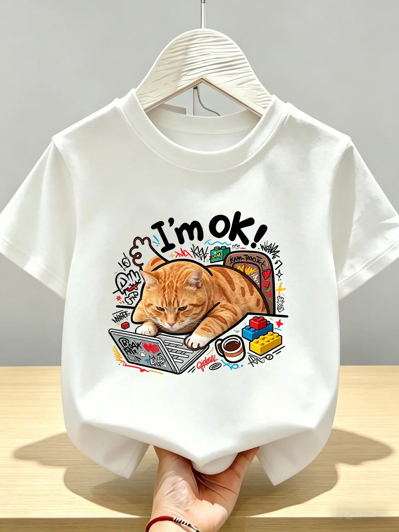 I'm OK Slogan Lazy Ginger Cat With Laptop Coffee Building Blocks Graffiti Graphic White Short Sleeve Kids Casual Tee