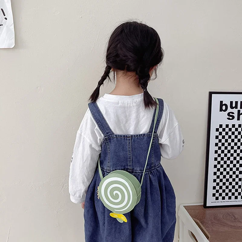 Bolso redondo pequeño para niños y niñas, bandolera de cuero PU con patrón de piruleta, monedero