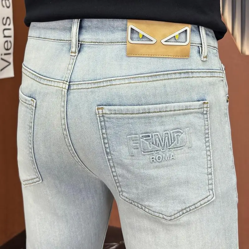 

Мужские джинсы Slim Fit, эластичные, модные, новинка 2026 года, с узором «Маленькое дьявольское глазо», средняя посадка, на молнии, из смесового хлопка