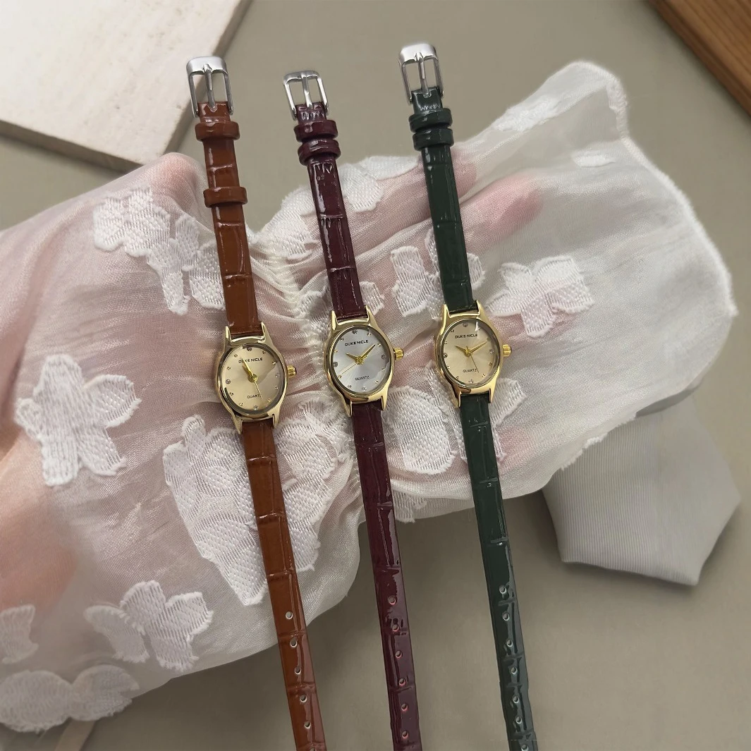 جديد خمر البيضاوي الصغيرة الهاتفي النساء الساعات عادية حلقة من جلد ساعة كوارتز فستان السيدات ساعة اليد ساعة حائط هدية Relojes Para Mujer