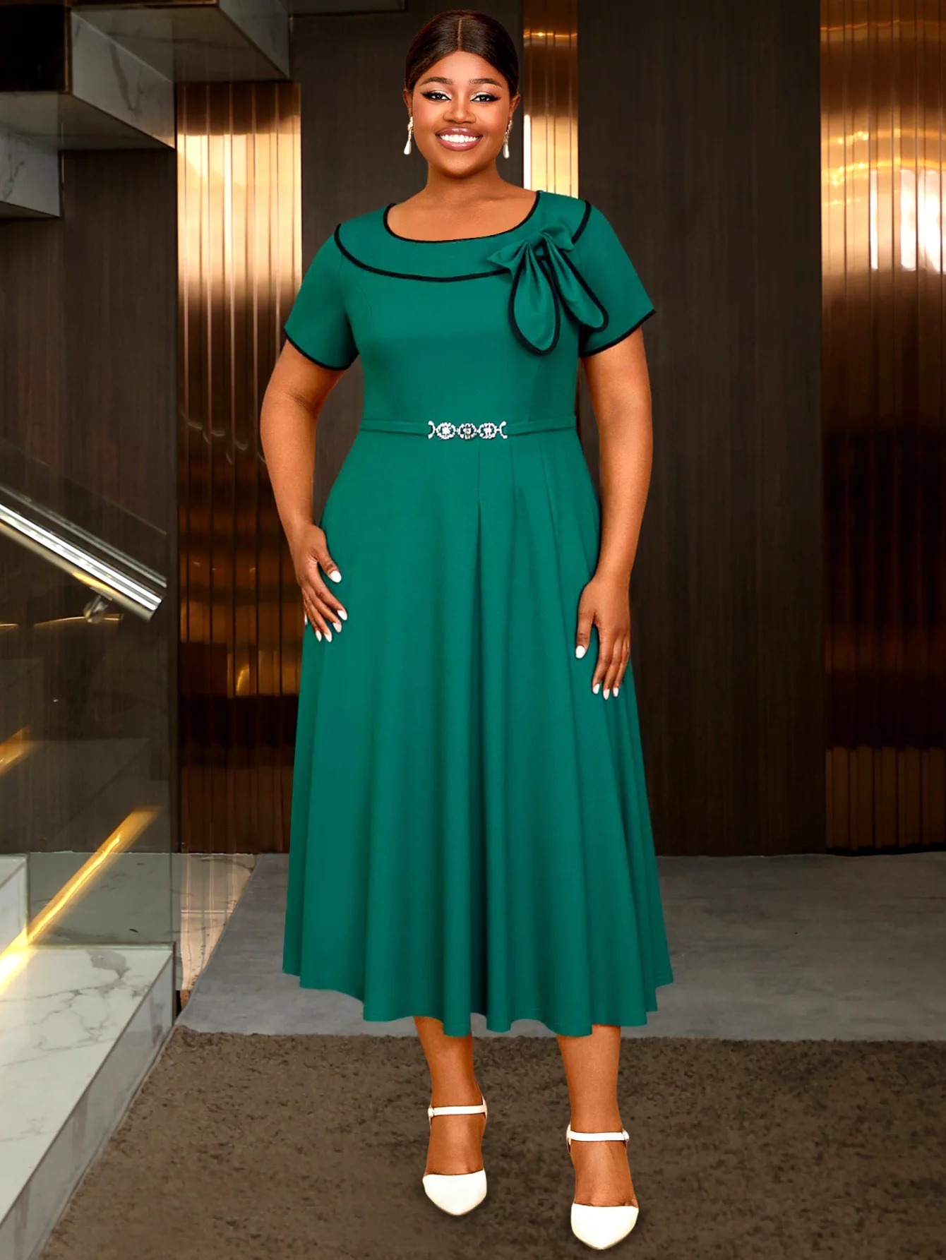 The 2025 new large-sized lapel bow with contrasting color trim A-line short-sleeved belt decoration dress in lake green
