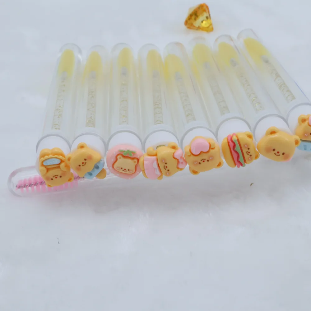 使い捨て漫画風黄色のクマ柄マスカラブラシ10本（チューブ付き）、クリスタルまつげブラシ（メイク用）