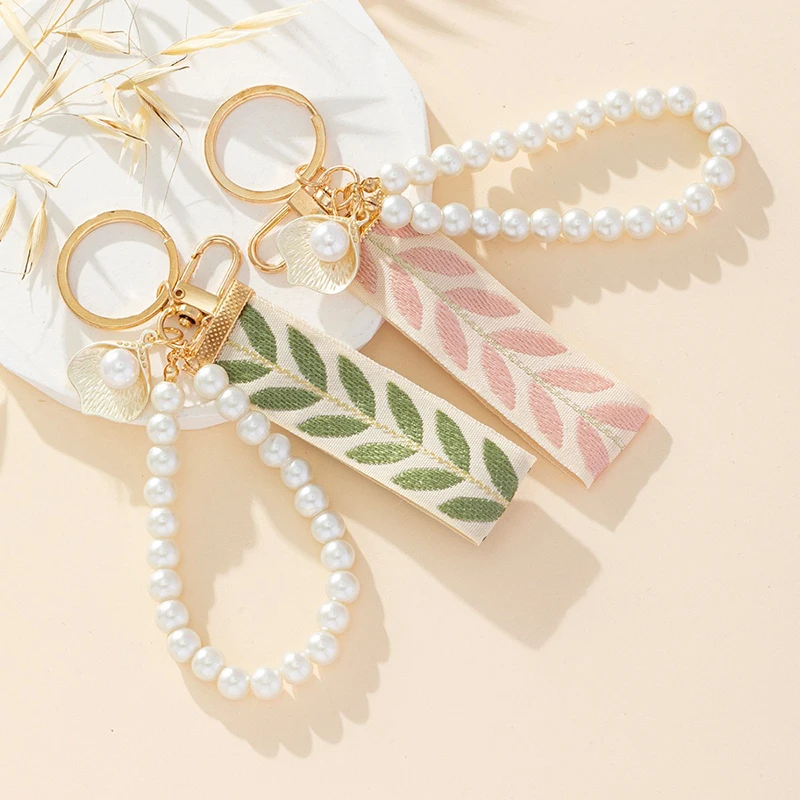 

Elegant Faux Pearl Keychain Leaf Shell Wristband Pendant Key Chain for Women Daily Decor Bag Charm Car Key Ring Birthday Gift
