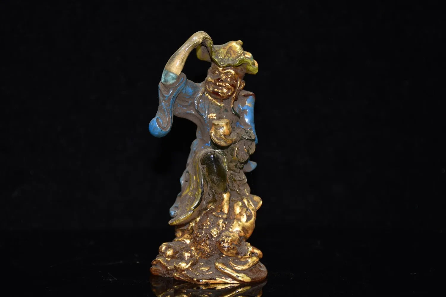 

Early collection of a cloisonné flower and gold-plated Buddha figurine with the deity playing with a golden toad, finely crafted