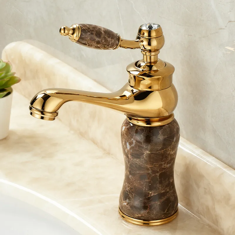 

Golden bathroom faucet made of brass and jade basin