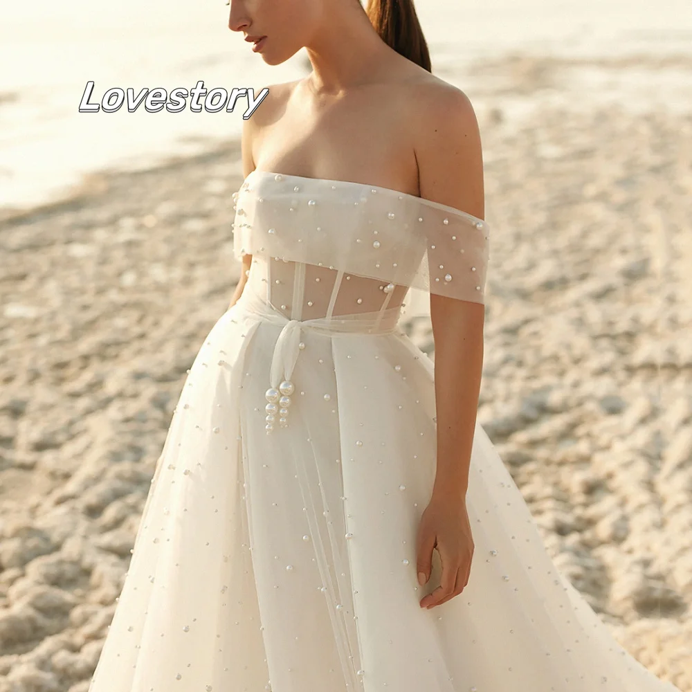 

Elegant A Line Wedding Dresses With Pearl Tulle Off Shoulder Backless Bride Dress Illusion Bridal Gown Vestido De Novia