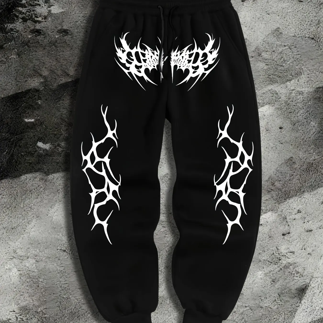 New autumn/winter men's Halloween track pantsfeaturing aunique gothic-style print,elastic drawstring waist andcomfortablelength.