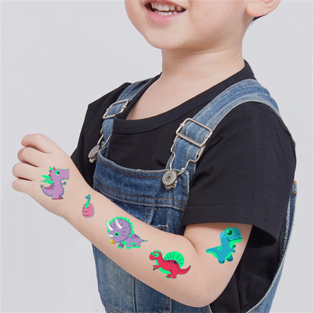 Pegatina de tatuaje de pintura luminosa de dinosaurio Popular para niños, tiranosaurio divertido de dibujos animados, juguetes fluorescentes temporales impermeables