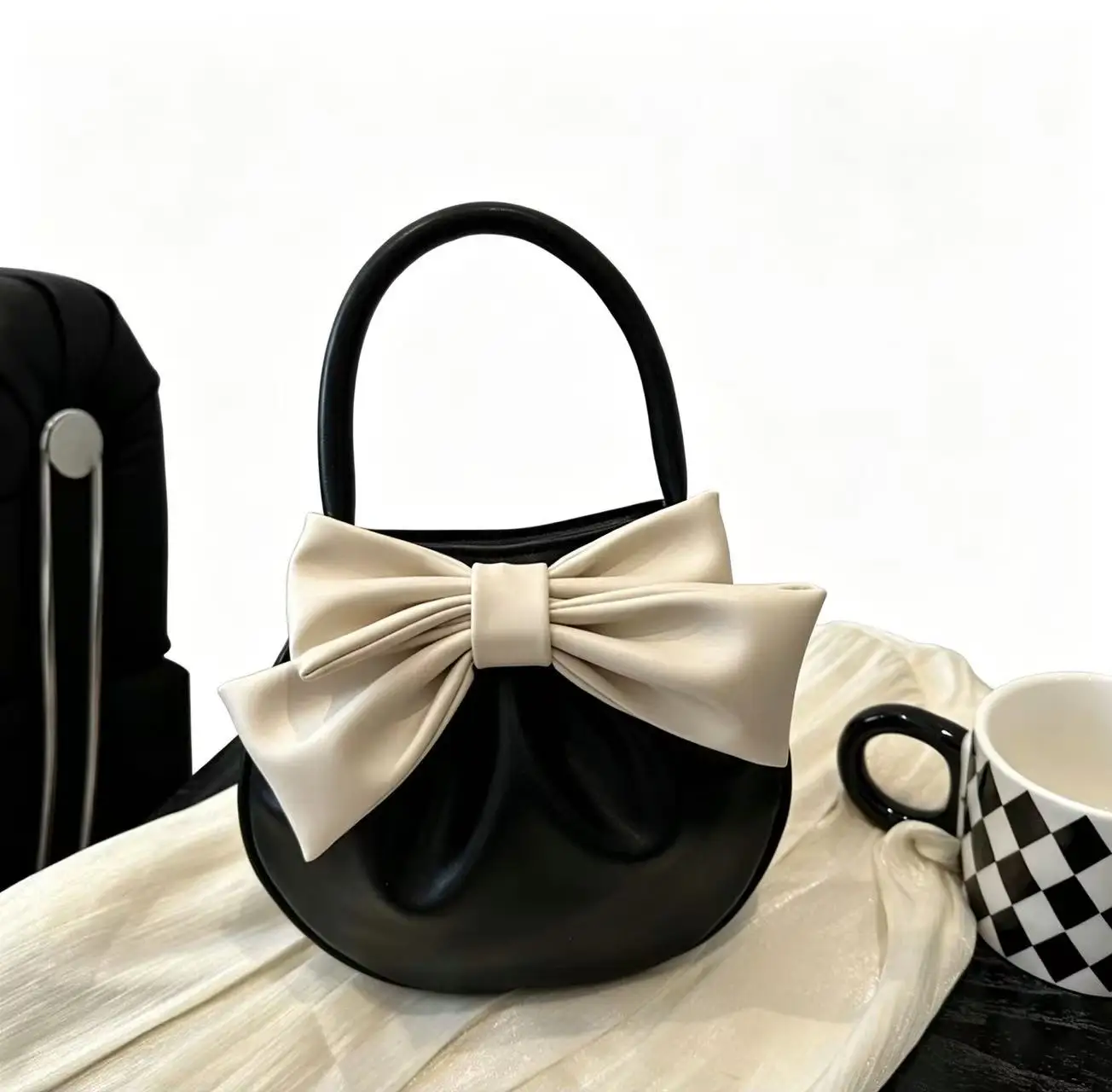 Pu Niche Design Bowknot Handbag 2026 New Style Elegant Color-Blocking Small Round Bag Fashionable Versatile High-Value Women's Bag