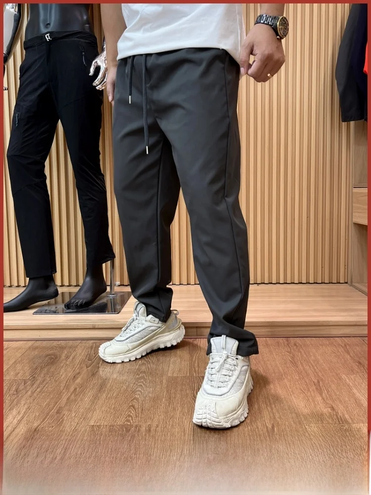 

Удобные спортивные повседневные брюки для мужчин с эластичной резинкой на талии, многоцелевые осенние новые поступления, дышащее полиэфирное волокно