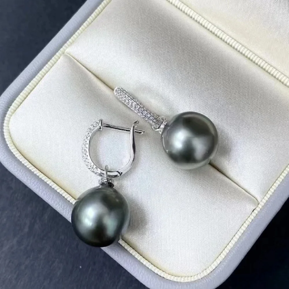 

Модные серьги с натуральным таитянским круглым жемчугом AAAA10-11 мм, серебро 925 пробы.