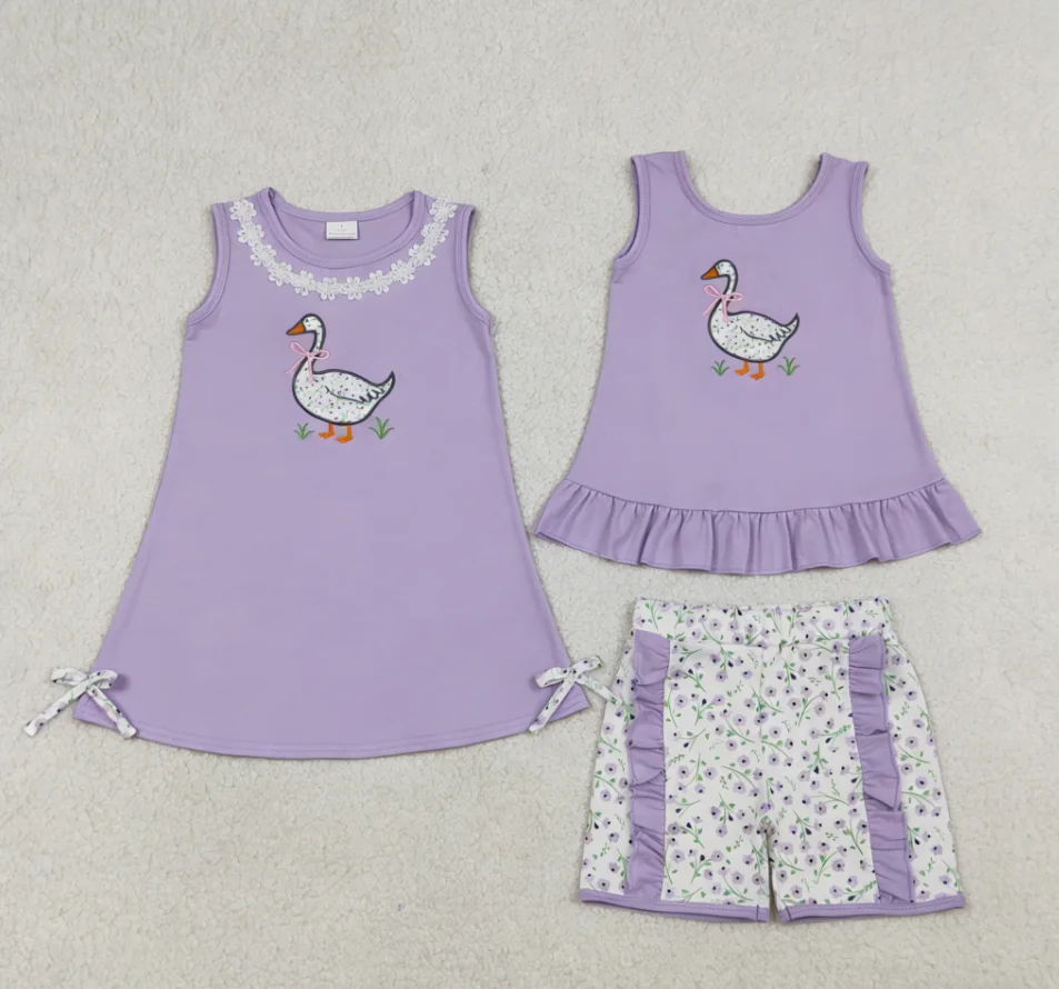 conjunto-infantil-atacado-para-meninas-blusa-roxa-bordada-com-lacos-e-shorts-com-babados-florais