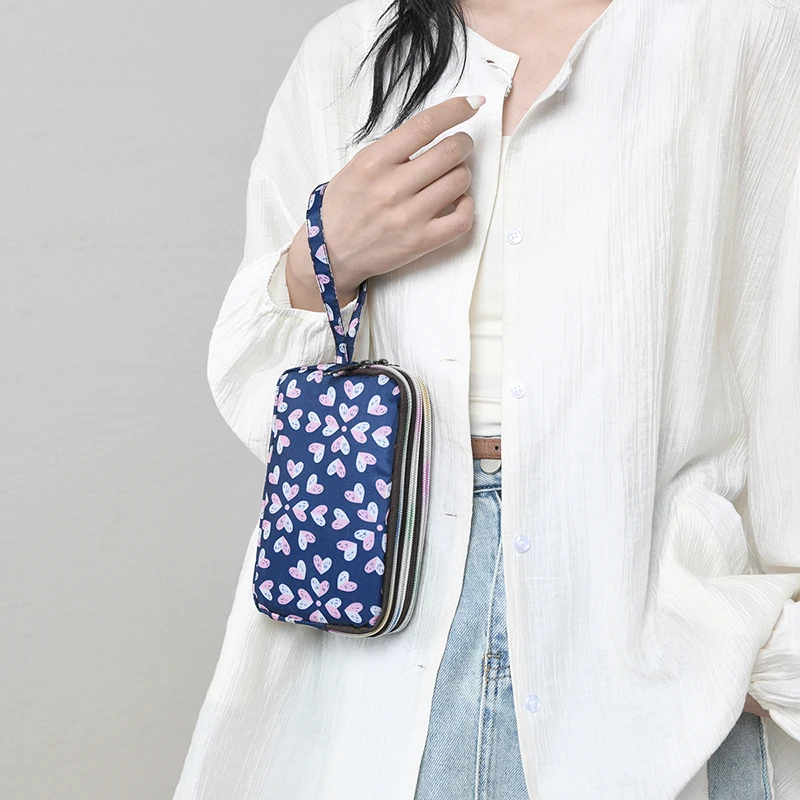 Zero wallet long-length canvas handbag, simple three-layer zipper handbag, small bag, large capacity mobile phone bag.
