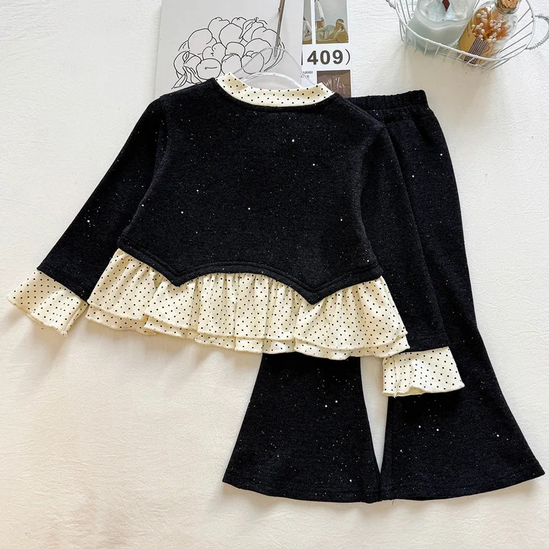 New autumn and winter collection for girls: a two-piece set featuring a shimmering, color-blocked polka dot top with a bow and e