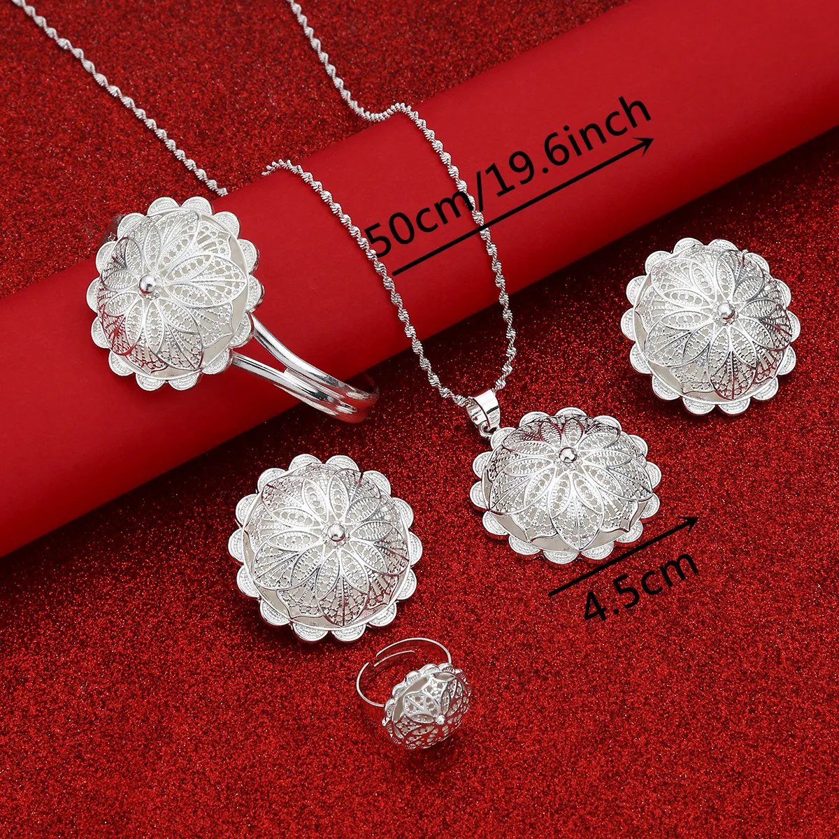 Silver plated hollowed out floral pattern women's jewelry set, including necklace, earrings, and ring