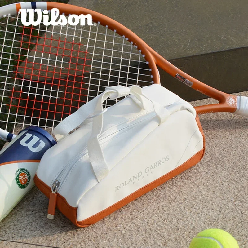 Wilson 2024 Roland Garros กระเป๋าเทนนิสขนาดเล็กกระเป๋าไม้เทนนิส tas TUR ขนาดเล็กกระเป๋ากระเป๋าถือแบบเล็กเดินทางไม้เทนนิสกระเป๋าหนังสีบรอนซ์