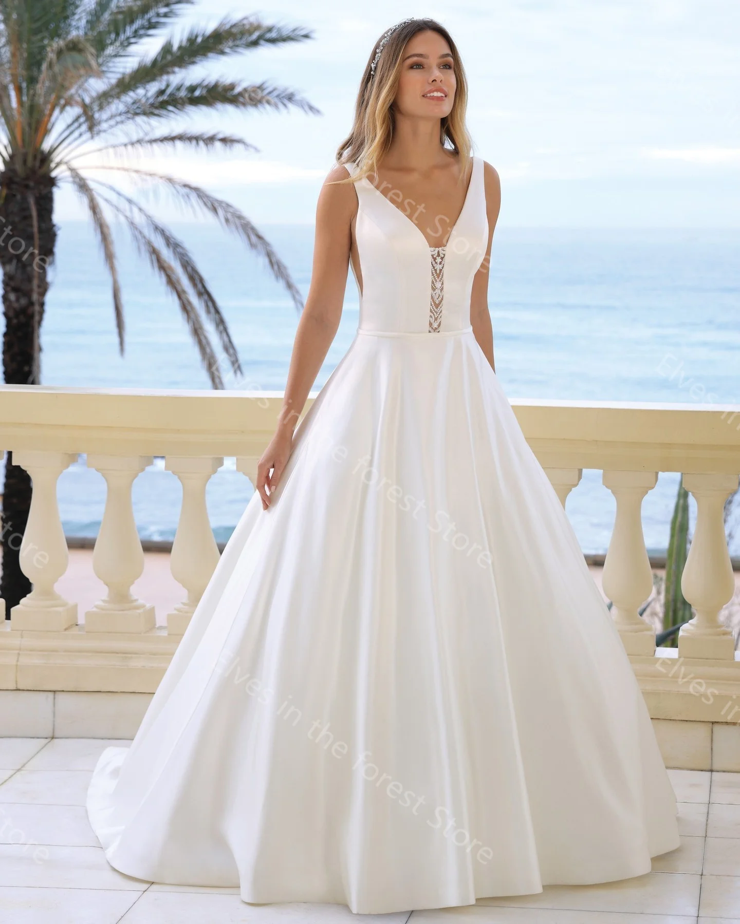 Puffy A Line abiti da sposa pizzo scollo A V senza maniche abiti da sposa Sexy indietro lunghezza del pavimento increspato abiti femminili De Mariee