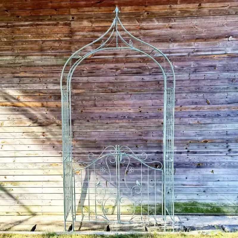 Metal Garden Arch with Gate, Ornate Scrollwork Patio Arbor for Climbing Plants Vines and Outdoor Wedding Ceremony Decor