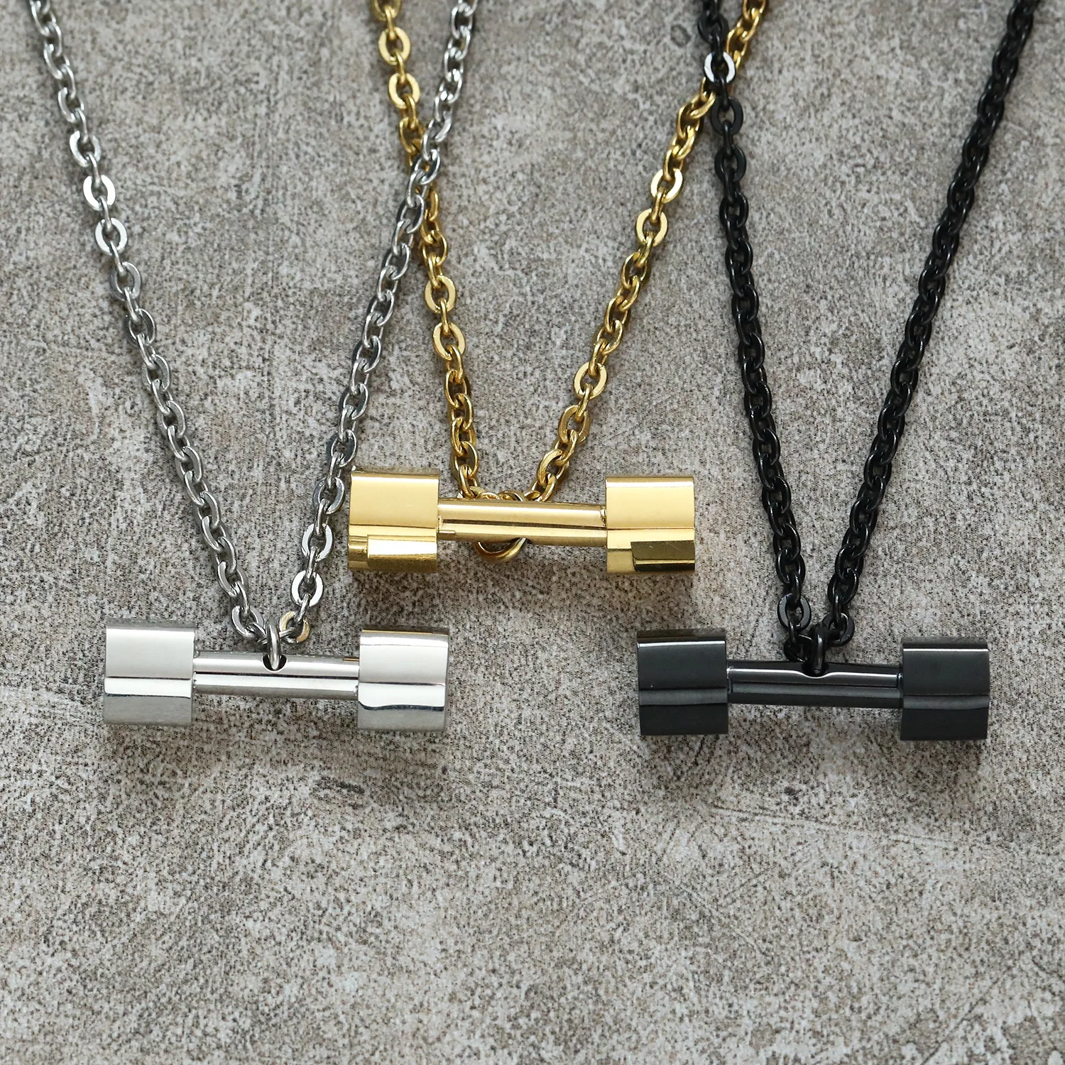

European and American fashion trend fitness dumbbell barbell titanium steel pendant