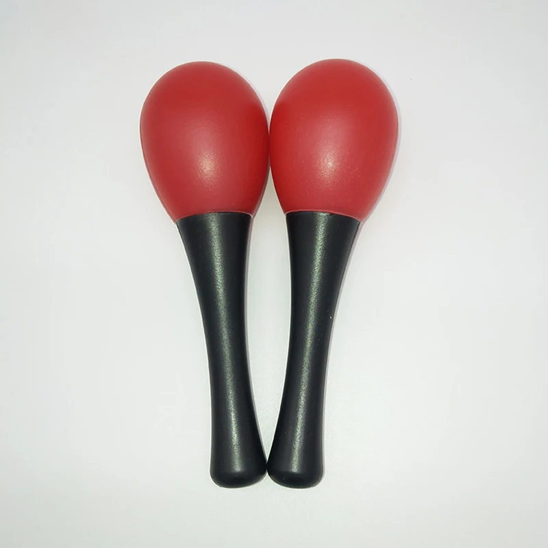 Plastic maracas Orff instrument players hold plastic maracas Toddlers Early education Children grasp egg maracas