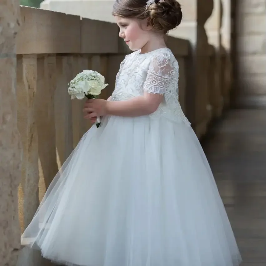 

Customzied Made Flower Girl Dreses Embellished Lace Peplum Bodice With Sleeves Finishing At The Elbows And Pearl Button