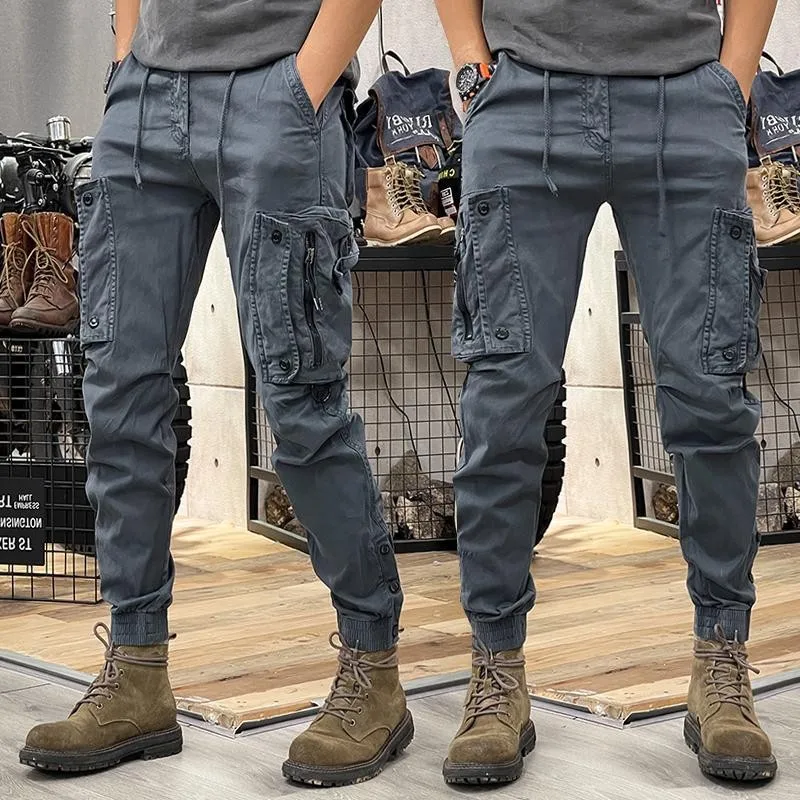 Pantalones de trabajo de Hip-hop Retro para hombre, pantalones de cintura elástica con cremallera, Bolsillo grande Simple, con cordones, estilo