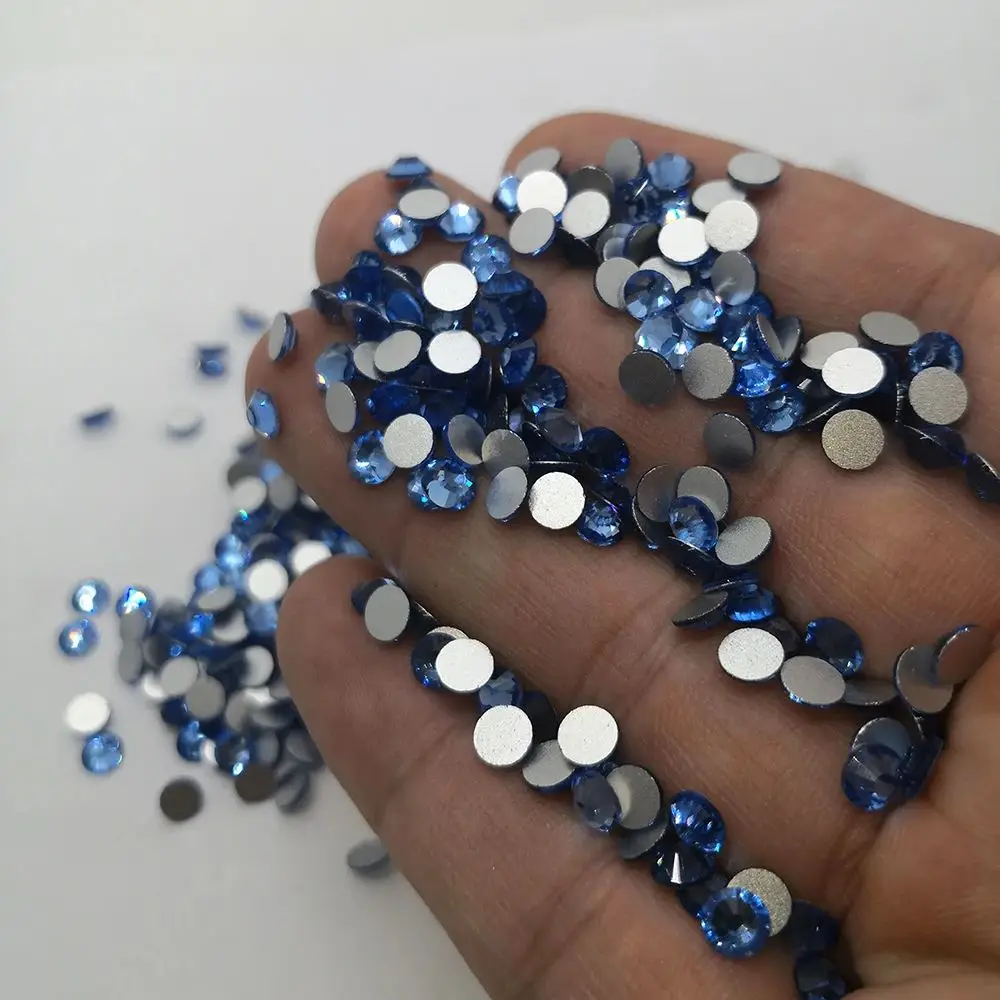 

Light Sapphire Glue On Flatback Nail Art Rhinestones Glass Stone Flatback Non Hotfix Rhinestone for 3D Nail Art Garment