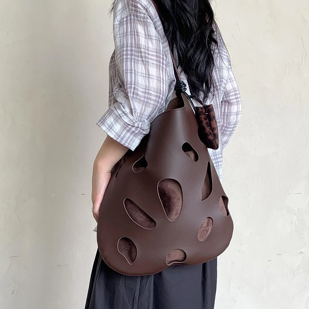 Irregular Hollow Women Shoulder Bag Fashion Designer Bag NEW High Quality Hobos Shopping Tote Bags for Women Bucket Bags Chic