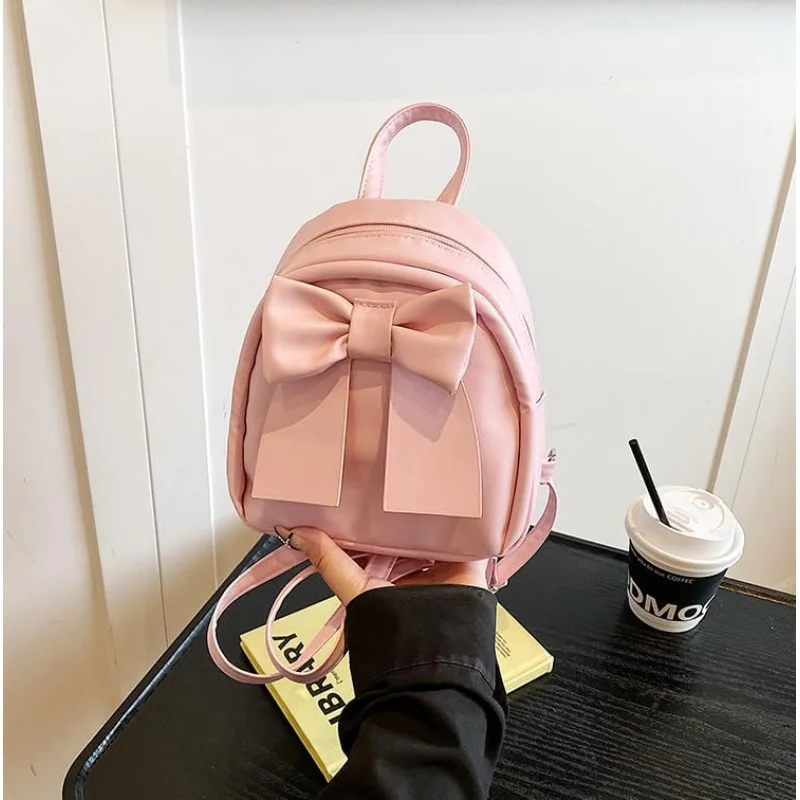 귀여운 리본 백팩 여성 패션 소형 숄더백 심플한 디자인 캐주얼 다용도 여행 팩(핑크)