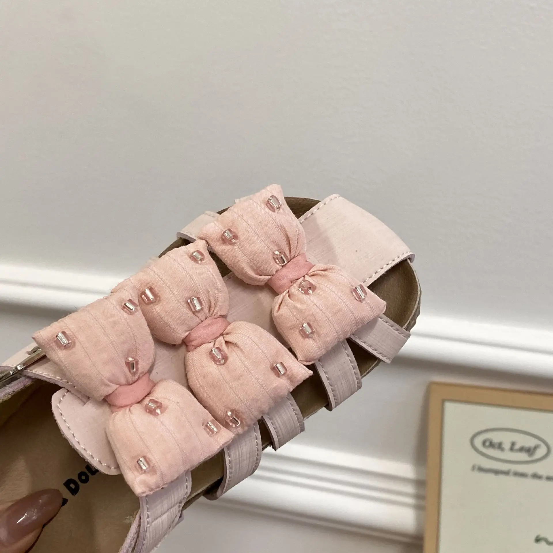 Picture 6: Girls Hollow Out Sandals 2026 Summer Bow Roman Sandals for Kids Breathable Beach Shoes Toddler Princess Sandals