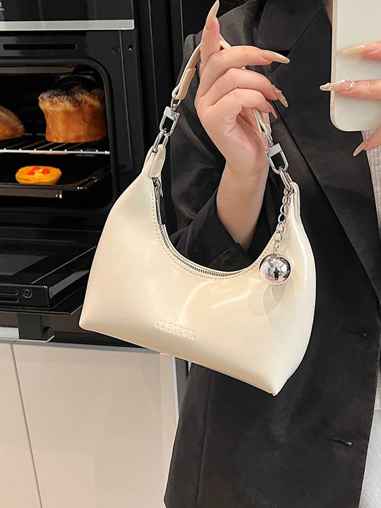 Podręczna modna torba damska Wiosna Nowa koreańska torba rekreacyjna z łańcuszkiem Pojedyncze torby na ramię Premium Solid Color PU Leather Crossbody Pack