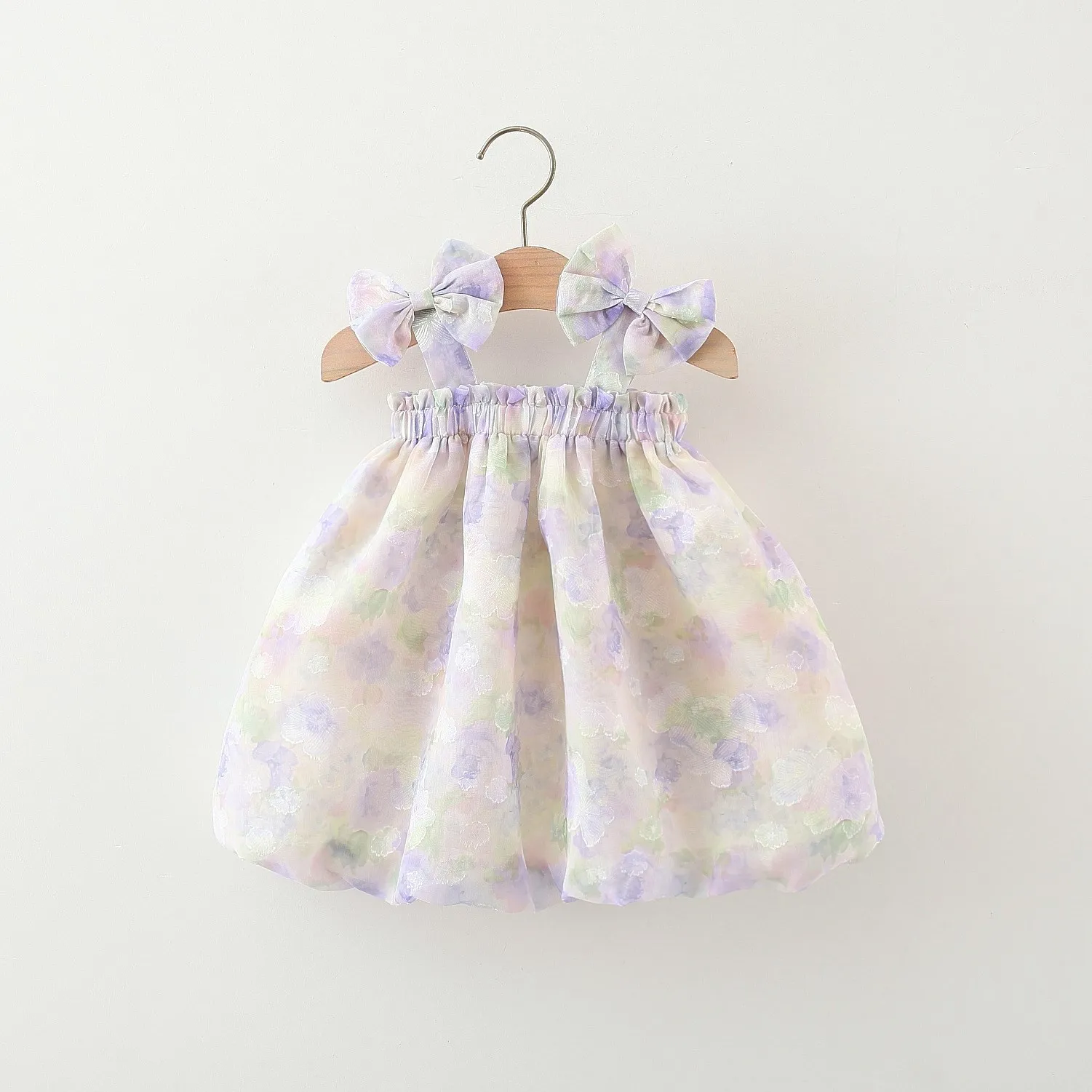 Summer children\'s dress baby girl covered in floral prints two bows and a princess dress with suspenders