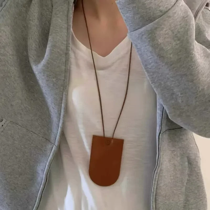 Korean leather rope pull-out multi-purpose bag 2024 new mini fashionable cowhide key bag premium temperament pendant